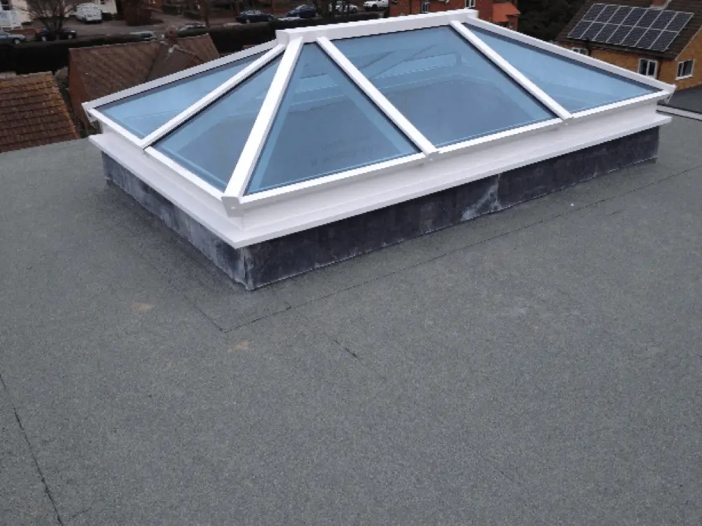 Finished flat roof with a white framed roof lantern