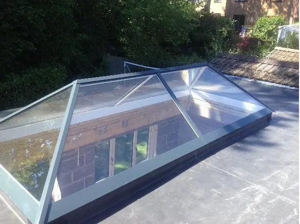 Glass roof lantern on a new single ply flat roof