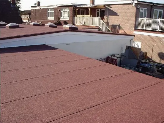Red felt flat roof on a commercial building